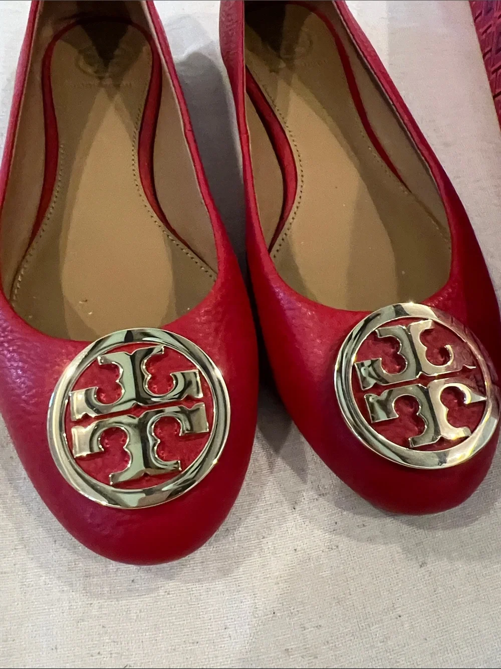 Tory Burch gold silhouette